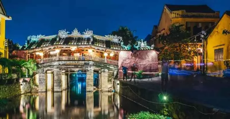 The Japanese Covered Bridge Shimmering Under the Lantern Lights