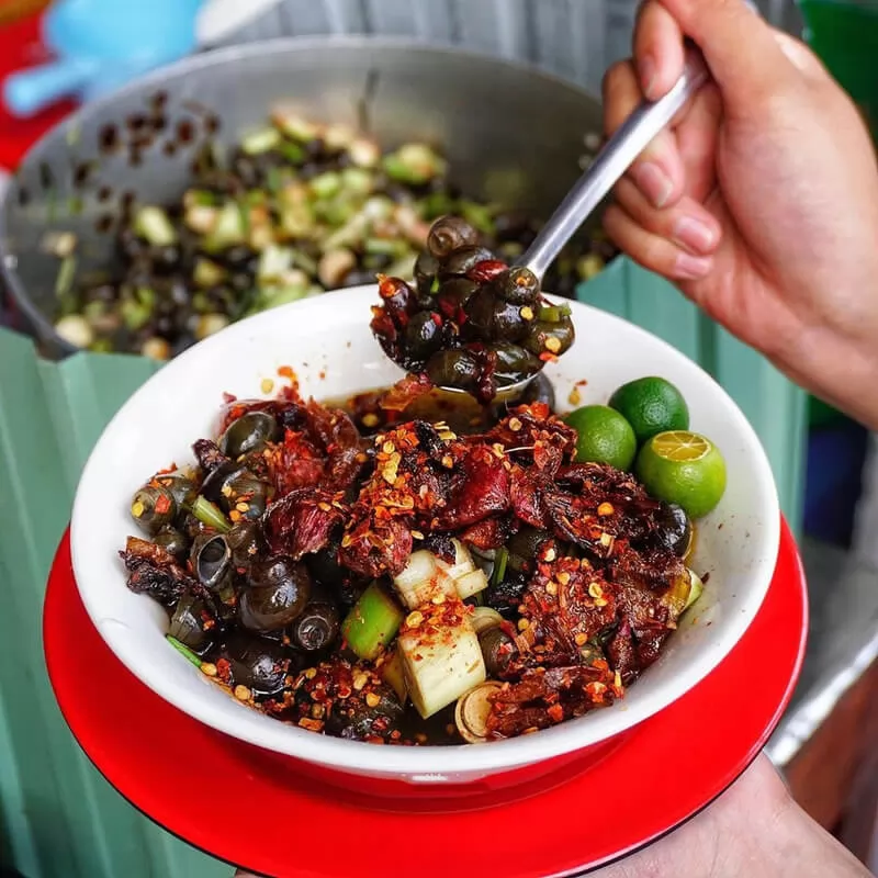 Ốc - một trong những m&oacute;n ngon Hội An du kh&aacute;ch kh&ocirc;ng n&ecirc;n bỏ lỡ